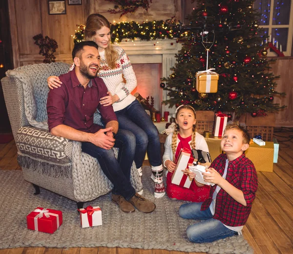 Happy family using hexacopter drone — Stock Photo