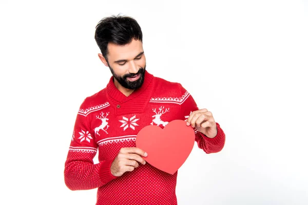 Smiling man holding red heart — Stock Photo