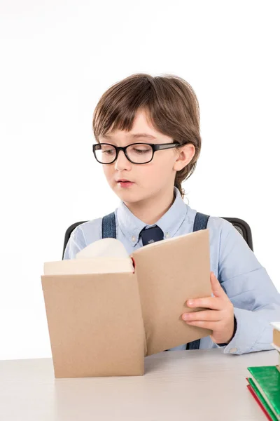 Schoolboy reading book — Stock Photo, Image