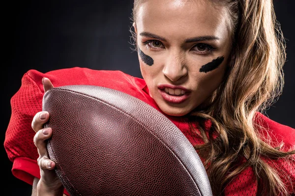 American football player holding ball — Stock Photo, Image