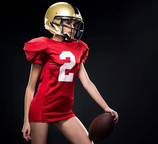 Female american football player in sportswear — Stock Photo, Image