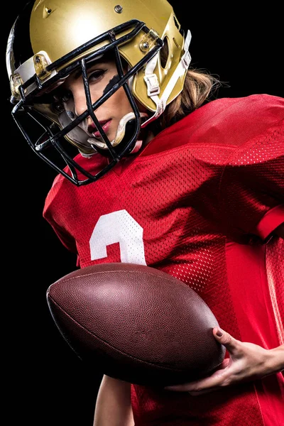 Vrouwelijke american football speler in sportkleding — Stockfoto