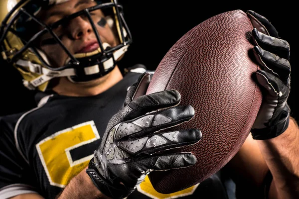 American football player holding ball — Stock Photo, Image