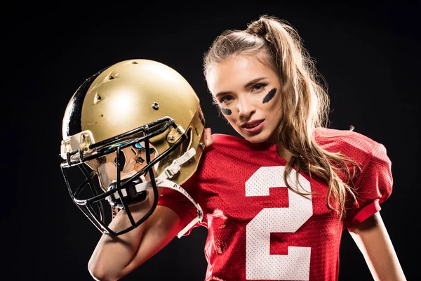 女子足球运动员和头盔的合影 — 图库照片