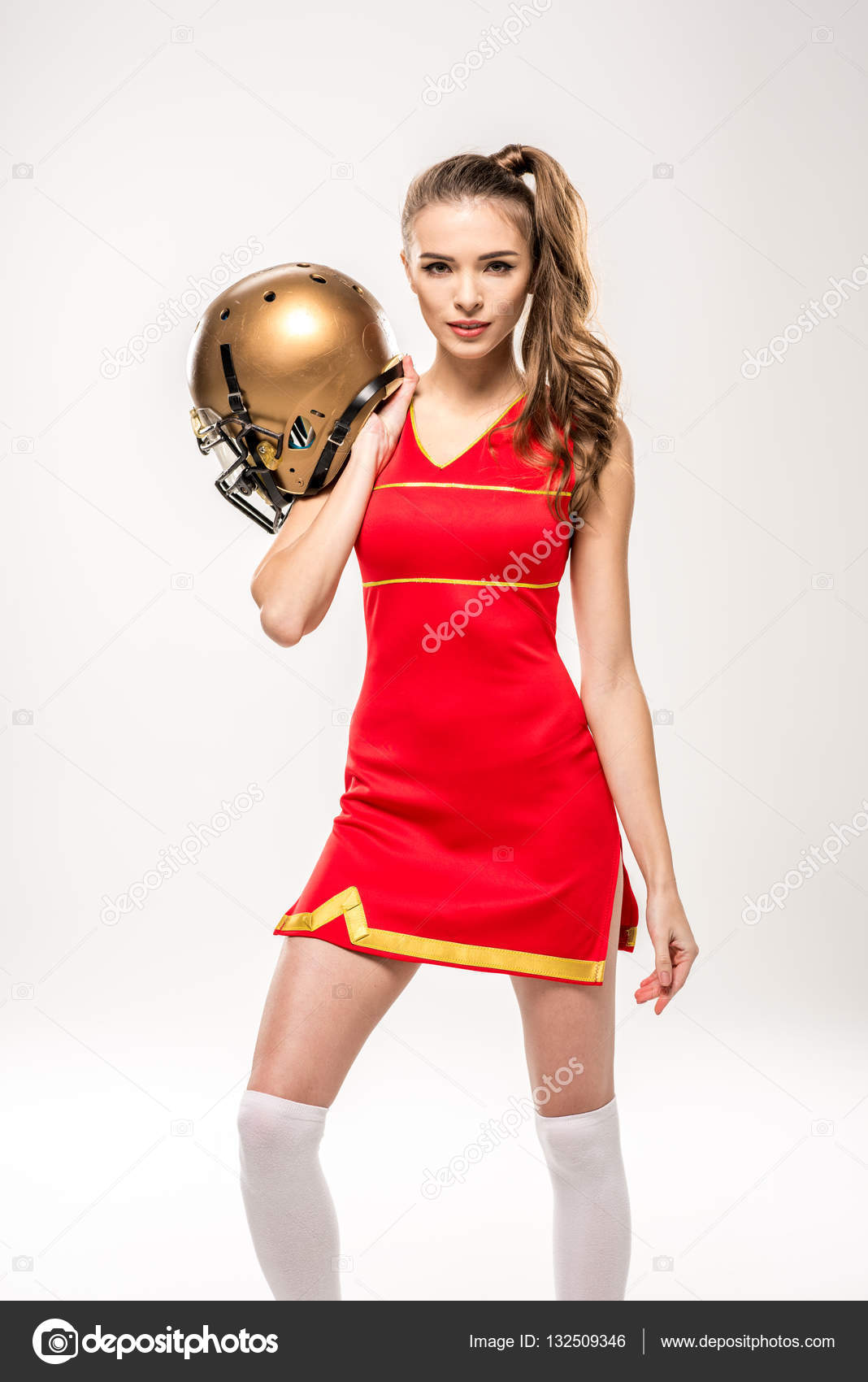 Cheerleader posing with helmet — Stock Photo © DmitryPoch 132509346