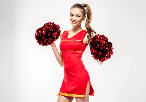 Cheerleader posing with pom-poms — Stock Photo, Image