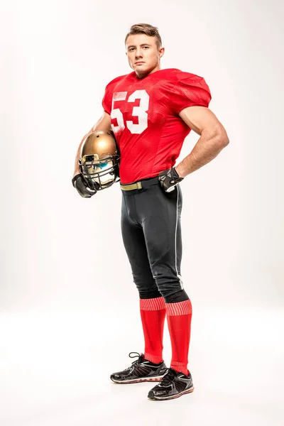 Jogador de futebol segurando capacete — Fotografia de Stock