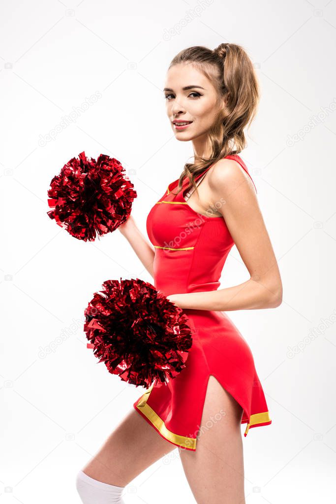 Cheerleader posa con pon pon - Foto Stock: Foto, Immagini