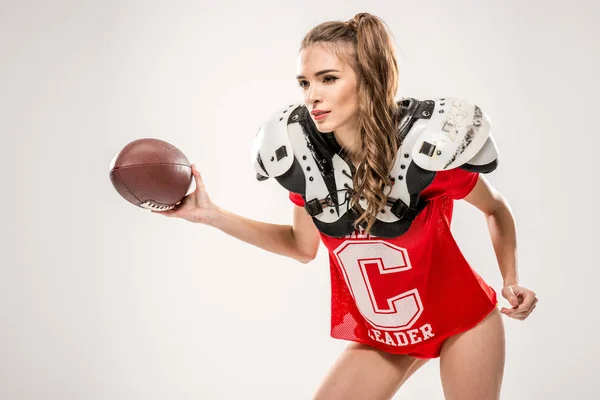 Donna che gioca a football americano — Foto Stock