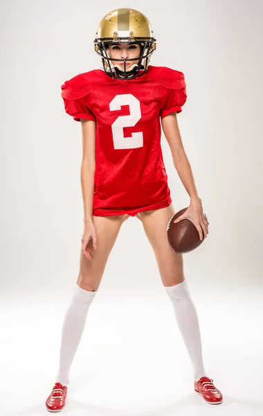 Beautiful female american football player — Stock Photo, Image