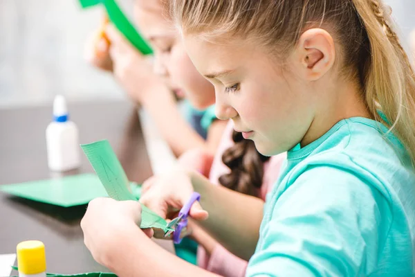 Schoolchildren making applique — Stock Photo, Image