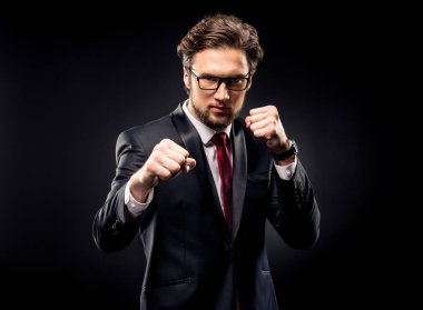 Aggressive businessman punching clipart