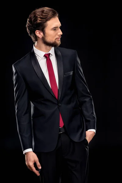 Handsome businessman in black suit — Stock Photo, Image