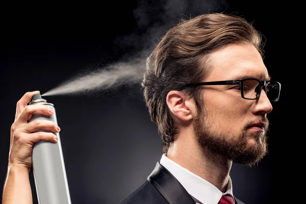 Stylist fixing hairstyle for businessman — Stock Photo, Image