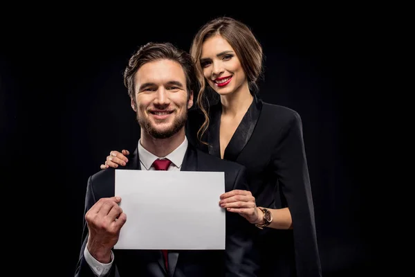 Couple holding blank card — Stock Photo, Image