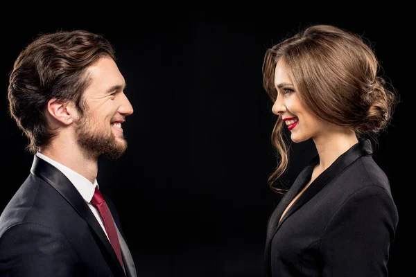 Laughing couple in formal wear — Stock Photo, Image