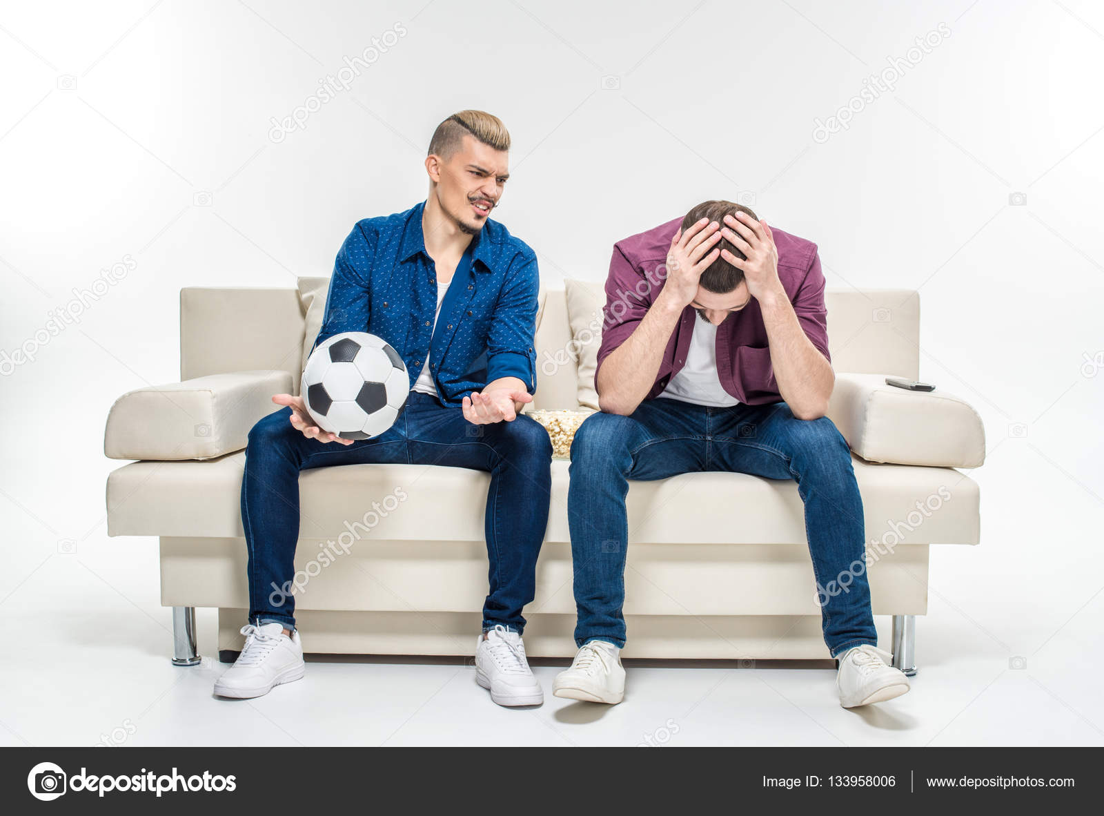 Friends Sitting On Couch With Soccer Ball Stock Photo Dmitrypoch Friends Sitting On Couch With Soccer Ball Stock Photo