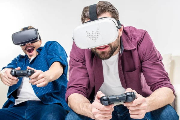 Friends in virtual reality headsets — Stock Photo, Image