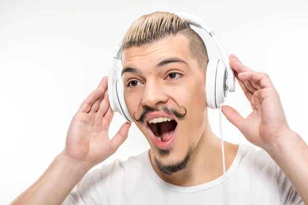 Happy man in headphones — Stock Photo, Image