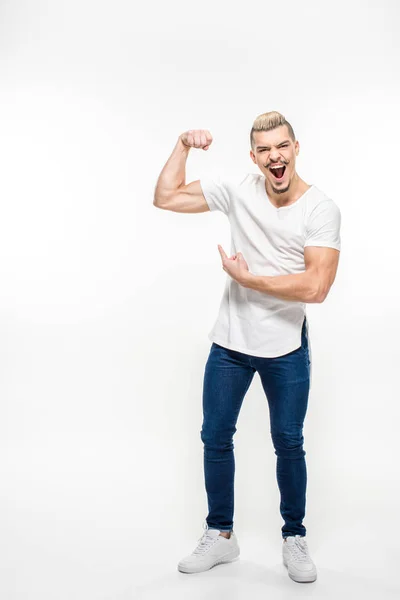 Hombre mostrando bíceps — Foto de Stock
