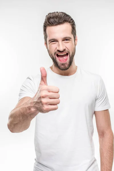 Hombre mostrando el pulgar hacia arriba — Foto de Stock