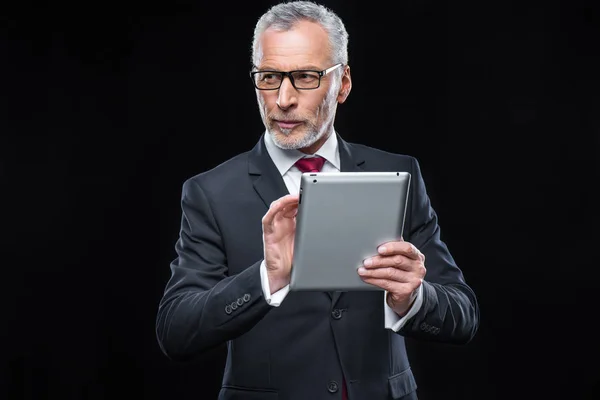 Businessman holding digital tablet — Stock Photo, Image