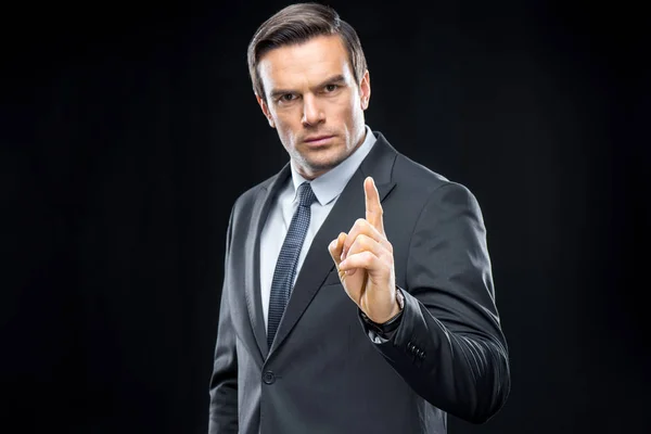 Handsome businessman gesturing — Stock Photo, Image