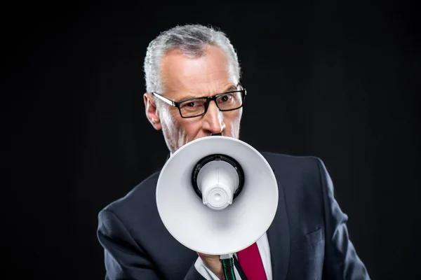 Mature businessman with loudspeaker — Stock Photo, Image