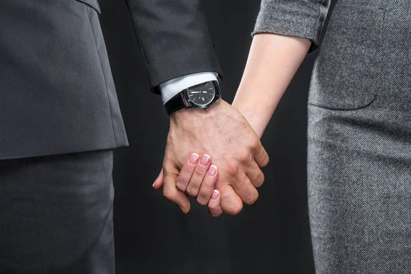 Man en vrouw hand in hand — Stockfoto