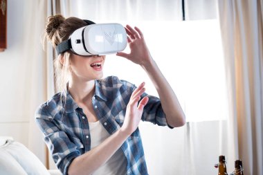 Woman in virtual reality headset clipart