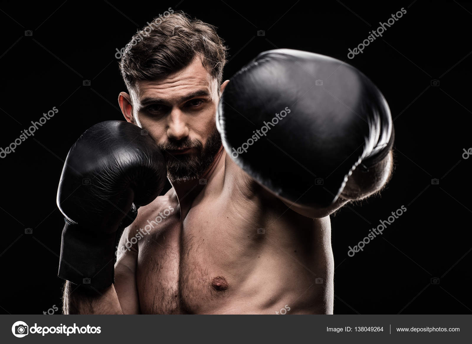 Sportsman in boxing gloves — Stock Photo © DmitryPoch 138049264