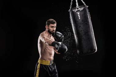 Boxer with punching bag  clipart