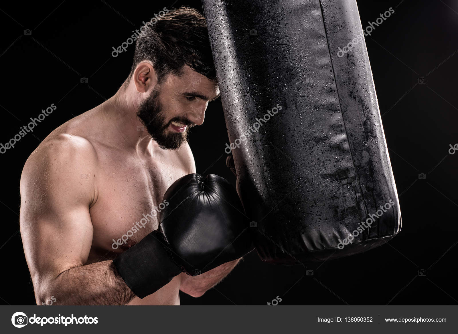 Boxer with punching bag — Stock Photo © DmitryPoch 138050352