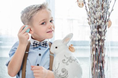 Boy with easter bunny   clipart
