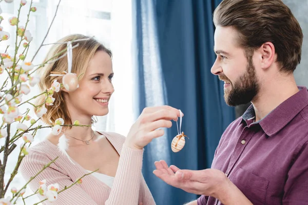 Couple with easter decoration — Stock Photo, Image