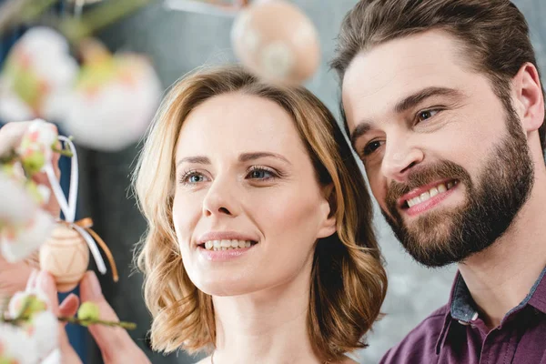 Couple with easter decoration — Stock Photo, Image