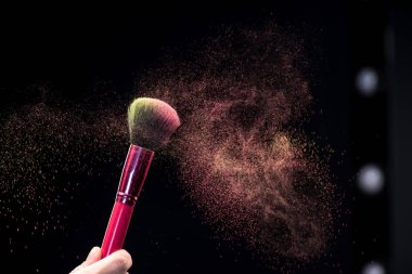 Make-up brush with powder explosion clipart