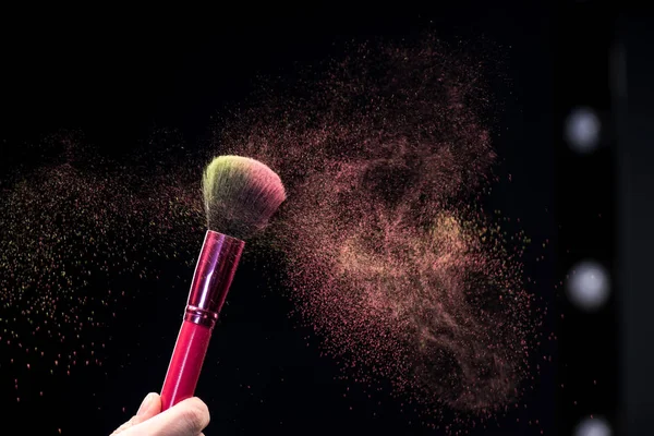Make-up brush with powder explosion — Stock Image Make-up brush with powder explosion Stock Photo