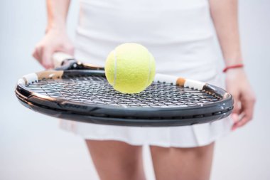 Female tennis player with racquet clipart