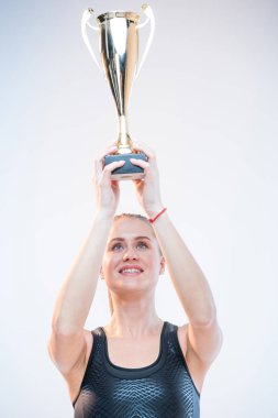 woman holding trophy clipart