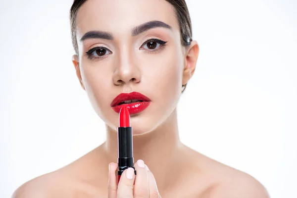 Woman holding red lipstick — Stock Photo, Image