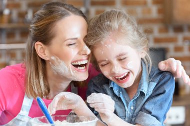 mother and daughter cooking clipart