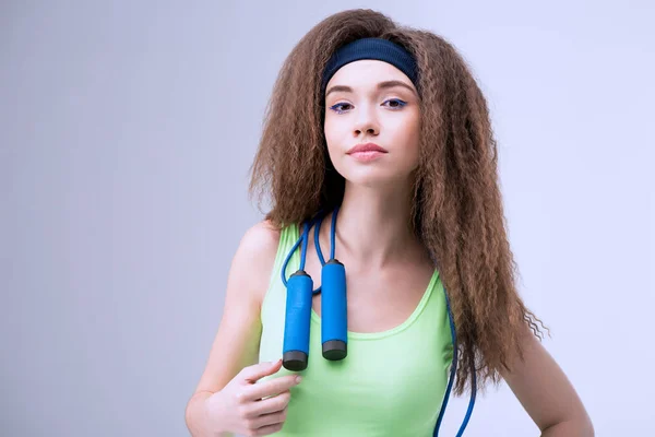 Woman with skipping rope — Stock Photo, Image