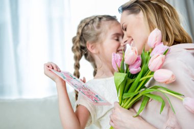 daughter greeting mother  clipart
