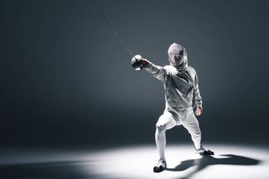 Professional fencer with rapier clipart
