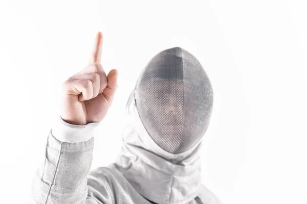 Professional fencer pointing up — Free Stock Photo