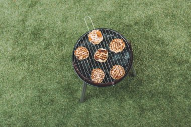 top view of grill with hamburgers clipart