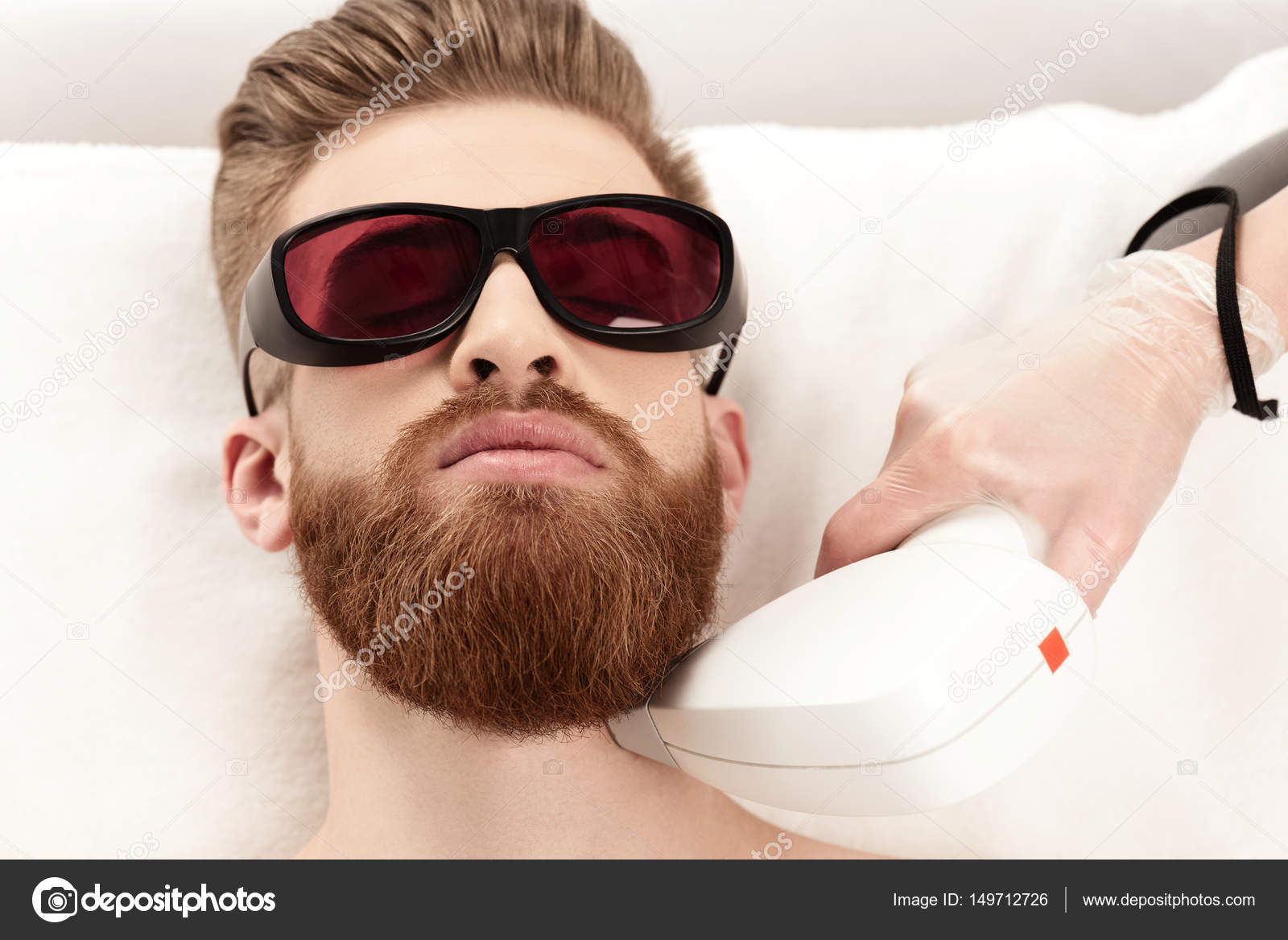 Man receiving laser skin care — Stock Photo © DmitryPoch #149712726