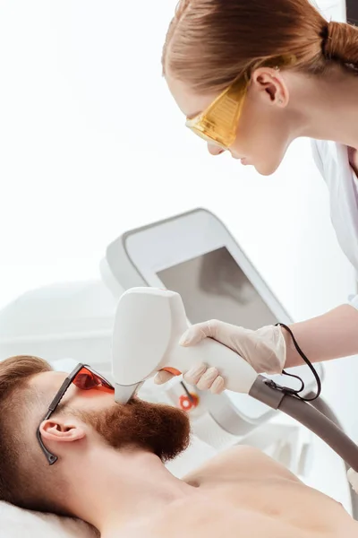 Man receiving laser skin care — Stock Photo, Image