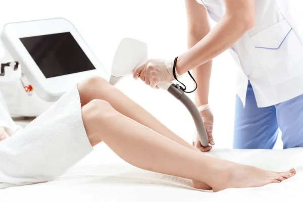 Woman receiving laser treatment — Stock Photo, Image